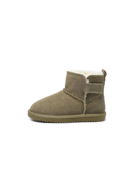 Green suede boot with white fur lining on a white background